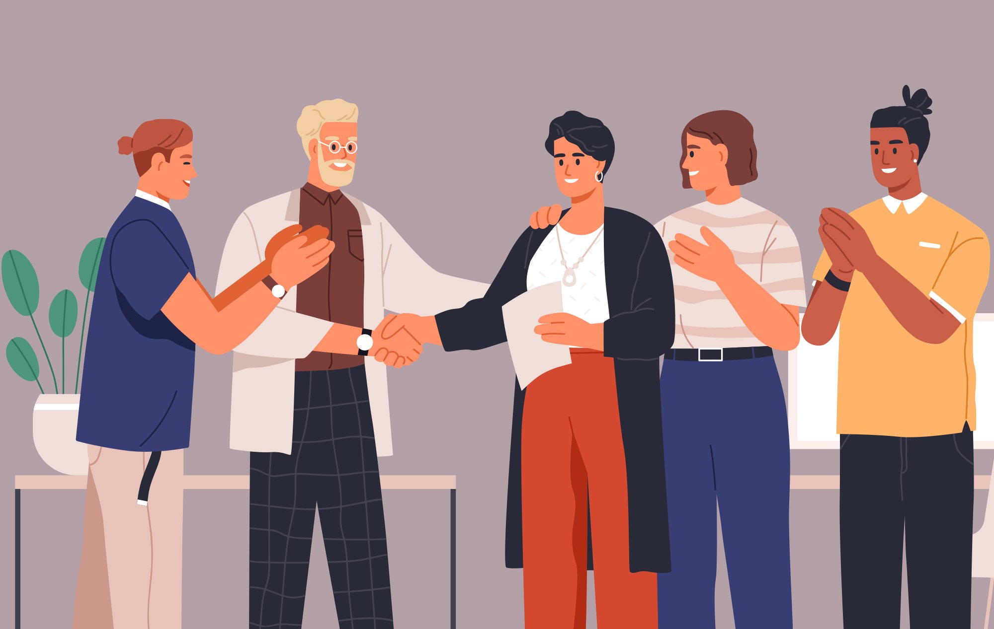 A group of coworkers welcoming a new person to their team and shaking hands. 
