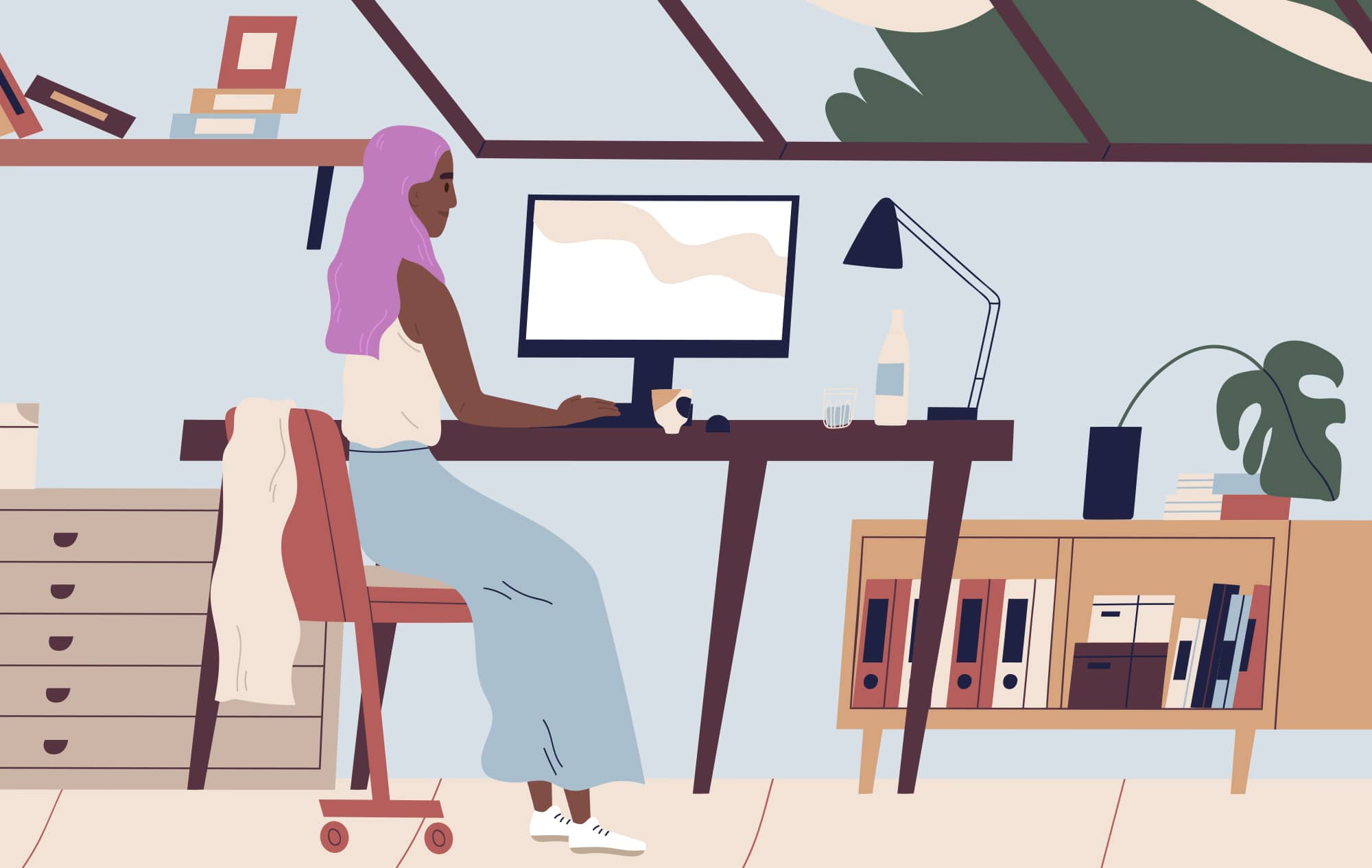 Illustration of a person sitting at their desk, typing. They have long, purple hair and lots of books in their office.